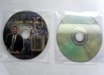 CD DVD in plastic sleeve with adhesive tape packaging